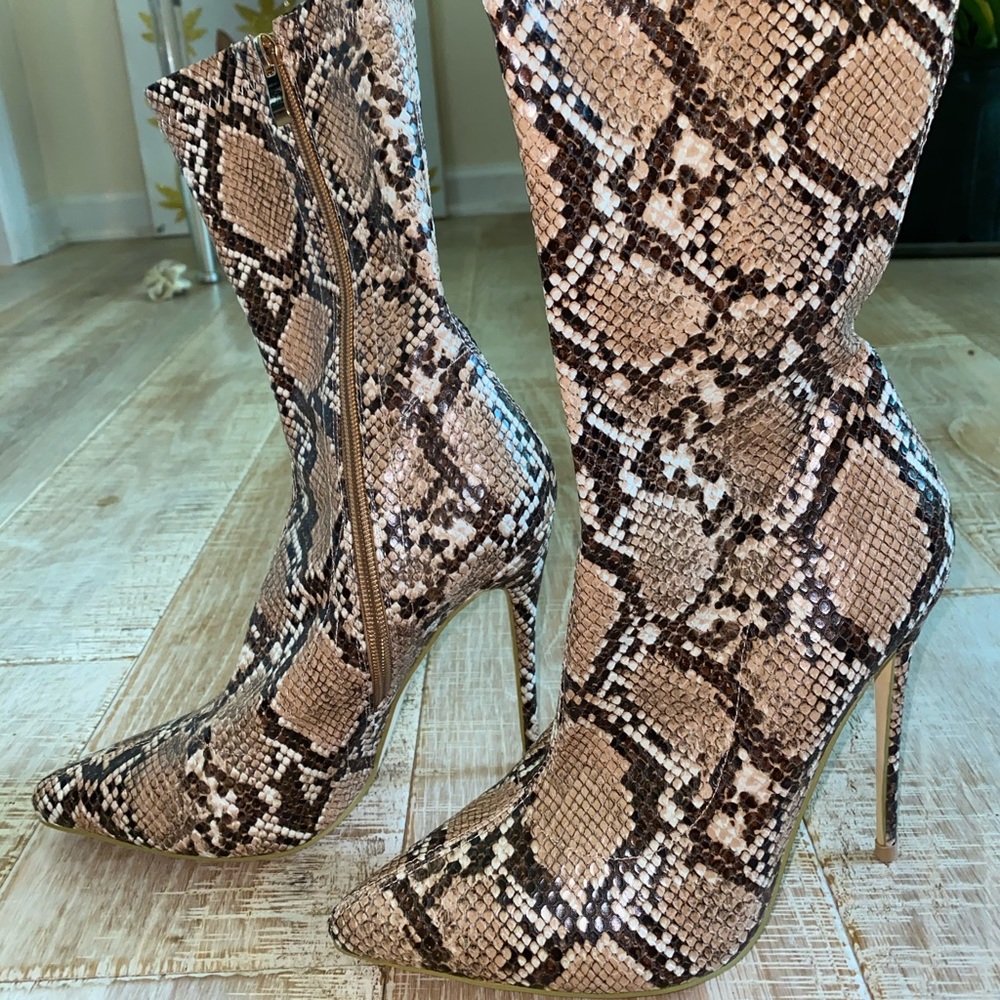 Snakeskin high heel boot